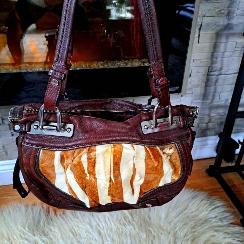 Zebra leather fur purse.  Authentic leather and fur.  Hardware in good vintage c